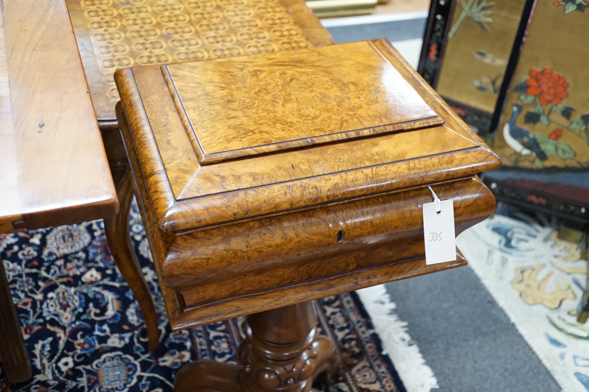 A Victorian burr walnut sarcophagus work table, width 38cm *Please note the sale commences at 9am.